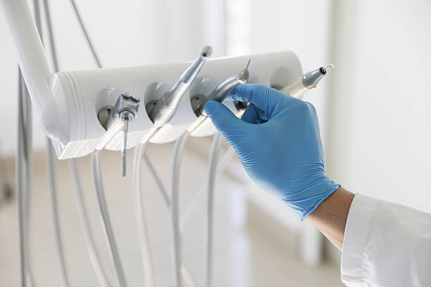 Professional Tooth Extraction technician working in Bluff City, TN
